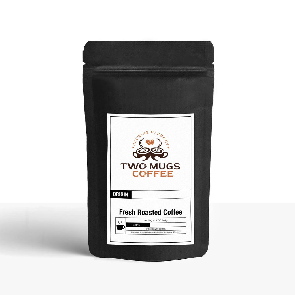 Black coffee bag with 'Two Mugs Coffee' label on a white background