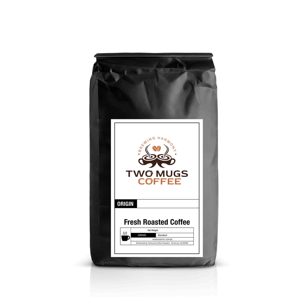Black coffee bag with 'Two Mugs Coffee' label on a white background