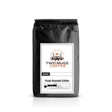 Black coffee bag with 'Two Mugs Coffee' label on a white background